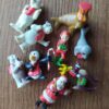 Colección de 10 Figuras de Villa Navideña de Coca Cola y El Grinch